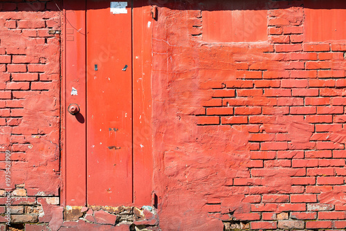 vintage industrial red brick wall background with a matching wooden door