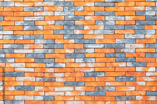 horizontal pattern of multicolor orange and grey brick wall texture