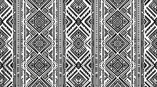 Intricate Black and White Geometric Textile Pattern with Repeating Diamond and Tile Motifs.