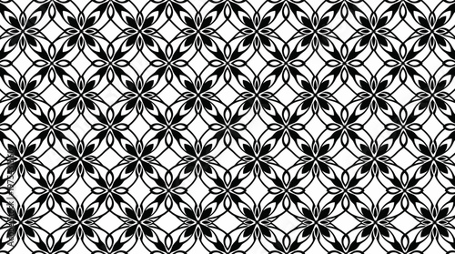 Intricate black and white damask pattern with floral motifs and symmetrical repetition.