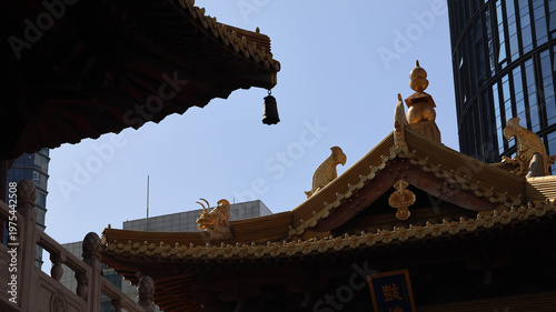 Bild auf Leinwand An oriental style building with elaborate gold decorations and traditional archi