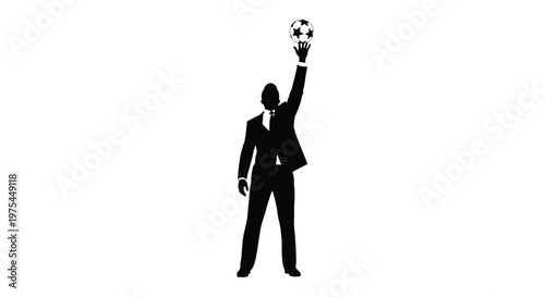 Silhouette of a businessman in a suit holding a soccer ball high above his head