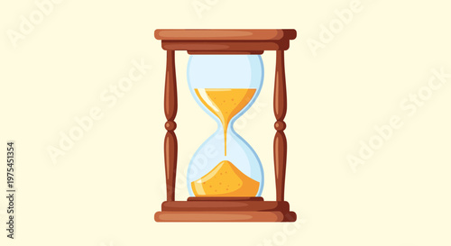 Elegant wooden hourglass with golden sand flowing through the glass to measure the passage of time in a classic way.