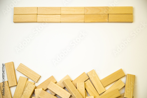 Top view of wooden blocks with space for text in the center. Concept of construction, wood, board games, development. High quality photo