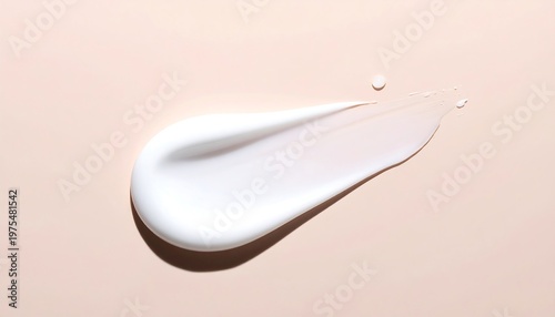 Creamy white swatch of cosmetic product on a beige backdrop