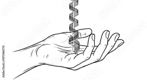 hand holding a spiral drill bit.