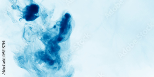 Light blur background with cyan, blue fog floating in the air.