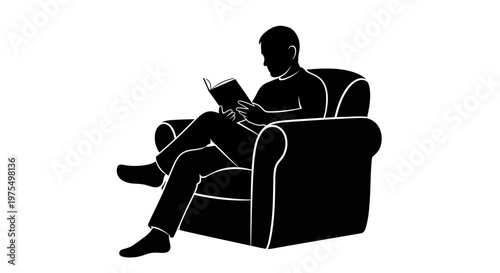 Man Sitting on Armchair Reading Book.