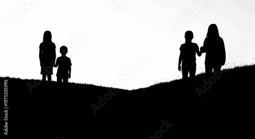Silhouettes of children standing on a grassy hilltop against a bright sky