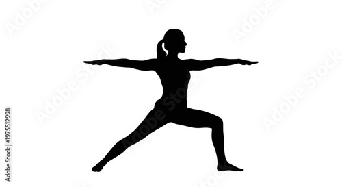 Woman in yoga warrior pose silhouette.