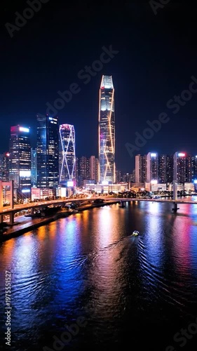 A vibrant modern cityscape with illuminated skyscrapers reflecting over a dark river at night