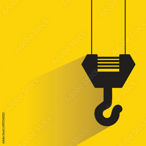 pulley crane hook icon on yellow background