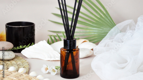 Bottle of Aroma Diffuser on Tropical concept Background