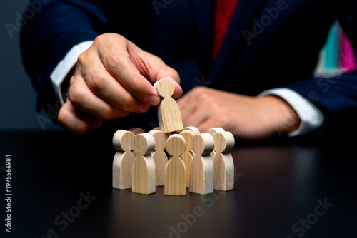 Business Leadership Concept – Hand Selecting Leader from Team, Human Resource Management and Recruitment Idea