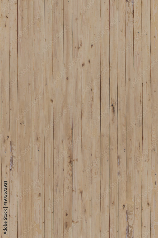 Naklejka premium Wooden planks forming a natural textured surface in indoor setting