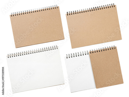 Four open spiral bound notebooks with blank white and kraft paper pages, ready for custom content and designs.