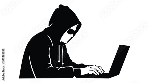 Silhouette of a hacker wearing a hooded sweatshirt typing on a laptop computer in the darkness