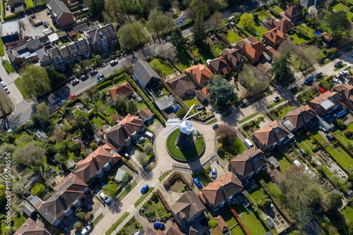 Quadro su tela Aerial view of the city of York UK suburb with a windmill house on a roundabout