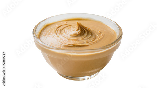 Foto Smooth peanut butter swirled in a clear glass bowl, isolated on transparent back