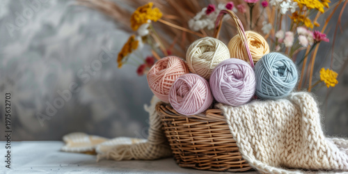 Still life of colorful yarn balls arranged in a woven basket