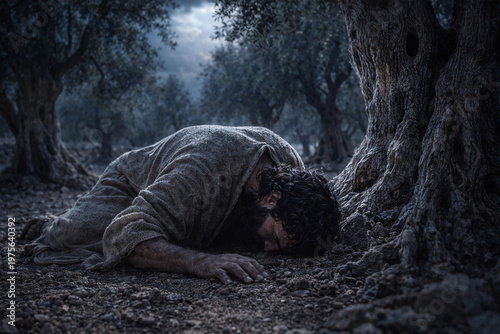 Jesus Christ in fervent prayer under moonlight in the Garden of Gethsemane.