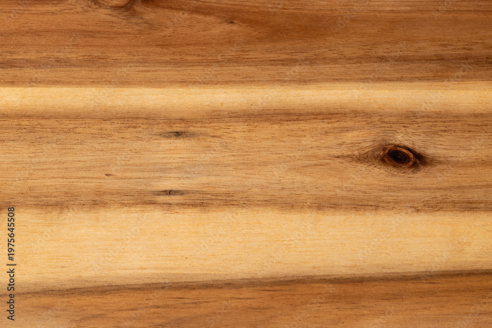 Fototapeta premium Natural light brown wooden board surface with organic grain patterns and dark knots showing detailed timber texture