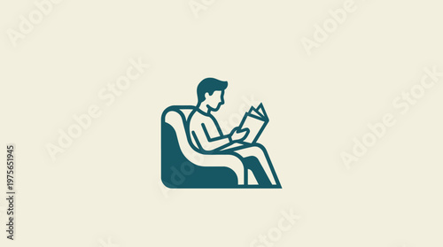 Person Reading Book In Armchair