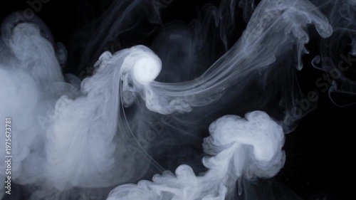 White smoke swirling against a black background, abstract gaseous texture and flowing vapor patterns for motion graphics.
