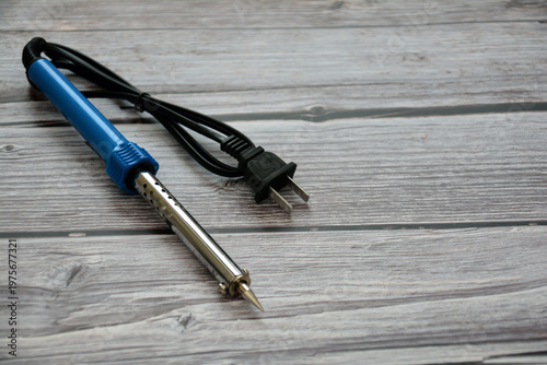 Billede på lærred Soldering iron on the table