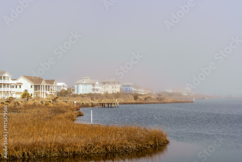 view of homes along Alligator Bay on a foggy winter morning in North Topsail Beach