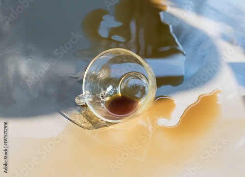 Drinks were spilled, and coffee stains appeared on the wooden floor.