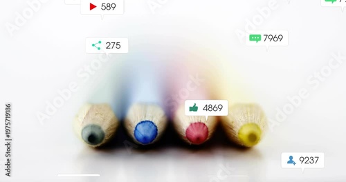 Four color pencils still on play, spawning social icons with counts around tips showing engagement