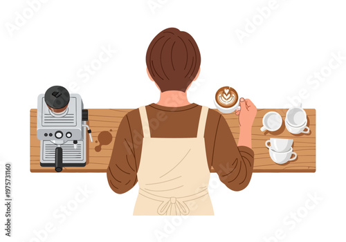 Barista preparing latte art on a wooden counter next to an espresso machine and cups
