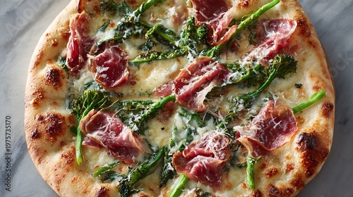 Pizza with salty ham, melted cheese, and peppery greens is served.