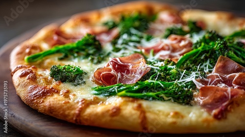Pizza with salty ham, melted cheese, and peppery greens is served.
