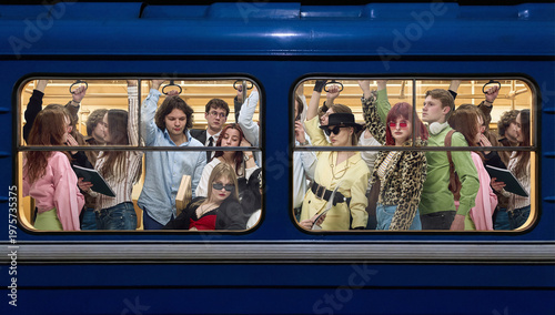 Packed subway train seen through windows with diverse passengers standing closely. Concept of overcrowding, public transport demand, urban infrastructure pressure, and shared commuting space.