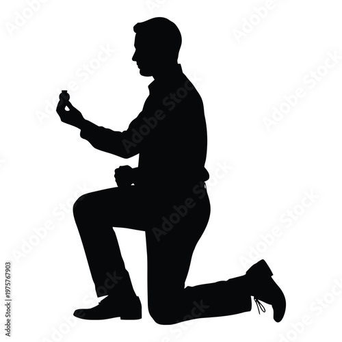 A silhouetted man kneeling while proposing with a ring in his hand