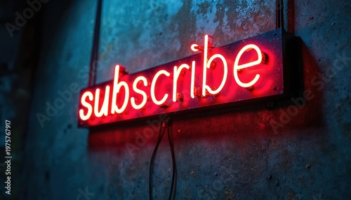 Red neon word subscribe glows on a rough textured wall. Sign provides retro industrial vibe for online content creators and businesses. This light display announces a call to action.