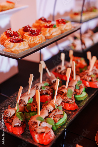 Catering service at a party with various food arrangements