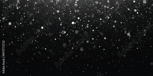 Abstract background featuring white glowing particles scattered across a deep black void space