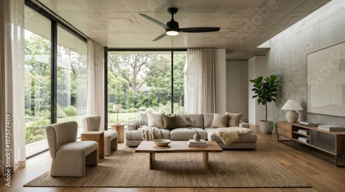serene luxury living room interior mockup, a contemporary couch beneath a sleek modern ceiling fan, soft daylight filtering through large windows, uncluttered styling and domestic comfort,