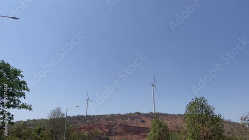 Wind Turbines on Hill Landscape  Clean Renewable Energy in Rural Terrain
