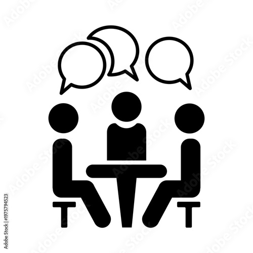 Group discussion takes place in a simple setting with three people sharing ideas and talking around a table