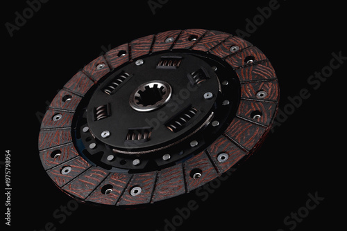 Foto car clutch disc close-up on a black background