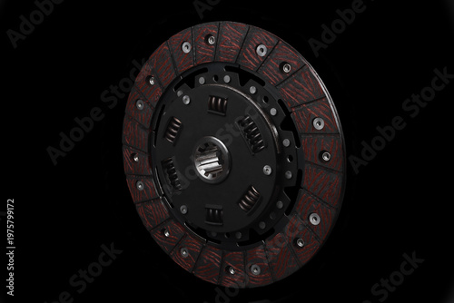 Foto car clutch disc close-up on a black background