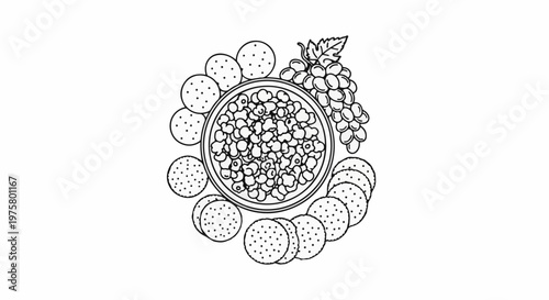 A cluster of round crackers surrounds a bowl of popcorn with grapes