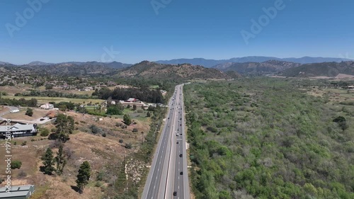 Aerial view of Fallbrook, Rainbow Crest, Rainbow Ridge with big mansion and green valley, San Diego County California