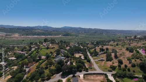 Aerial view of Fallbrook, Rainbow Crest, Rainbow Ridge with big mansion and green valley, San Diego County California
