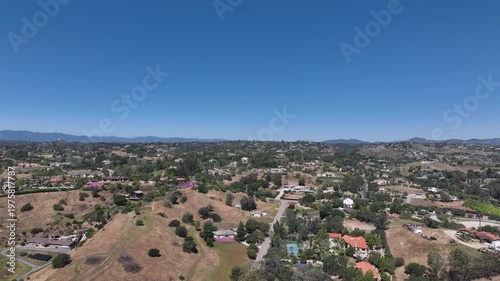 Aerial view of Fallbrook, Rainbow Crest, Rainbow Ridge with big mansion and green valley, San Diego County California