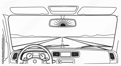 View from driver's seat, sun rising over highway